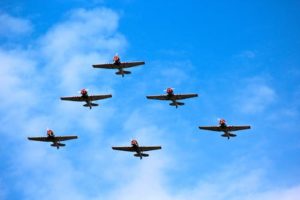 planes in formation against a sky background