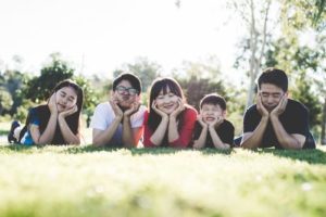 family outside in the sun